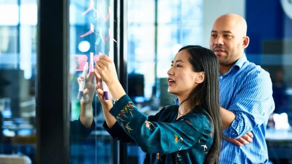 A man and a woman Scaling their Business